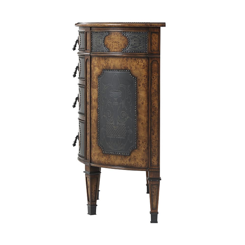 Комод с затейливой чеканкой