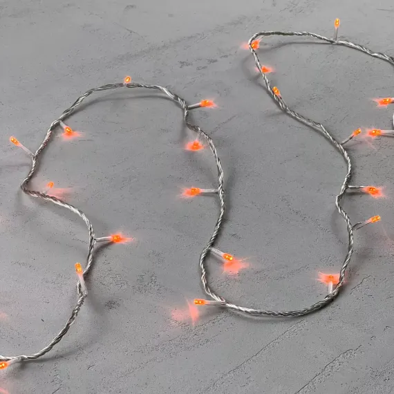 Светодиодная гирлянда с возможностью динамики 20 м., 200 оранжевых LED ламп, 24V., прозрачный силиконовый провод, IP65, Beauty Led (EST200-3W10-1OR)