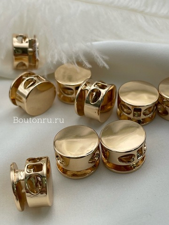 Фиксатор для шнурков плоский золотистый