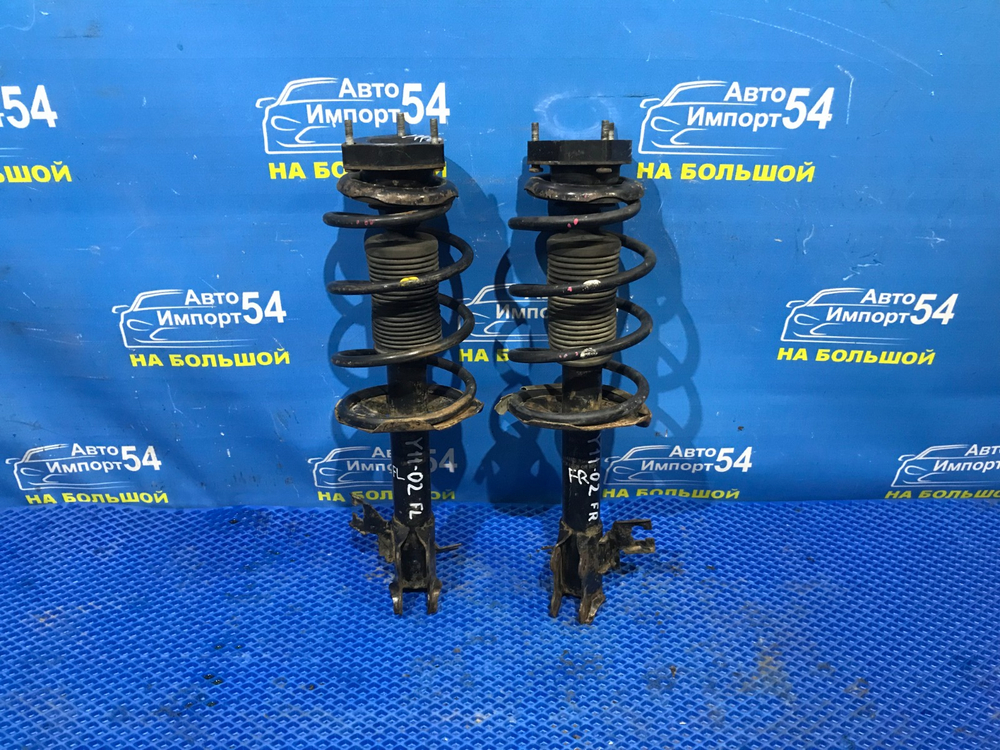 Стойка передняя левая NISSAN AD 1999