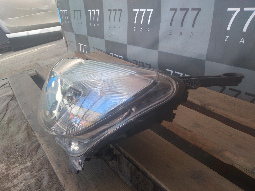 Фара левая Opel Astra J  Б/У Оригинал 13297720