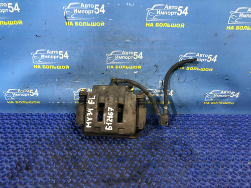 Суппорт тормозной передний левый NISSAN CEDRIC 1999-2004