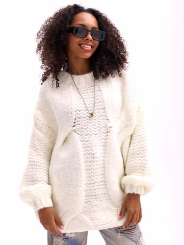 Шерстяной свитер женский