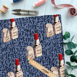 Ткань флис красная помада на синем фоне с надписями