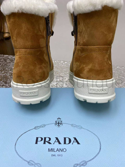 Коричневые высокие кроссовки Prada с мехом