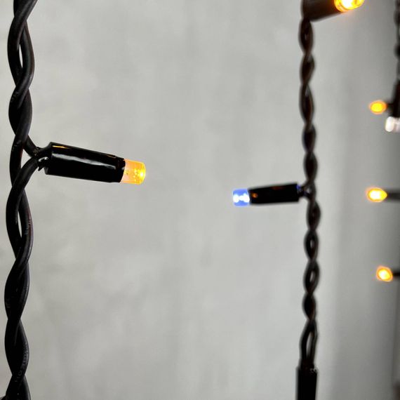 Светодиодная бахрома с колпачком 3,1*0,5 м., 120 желтых белых LED ламп, мерцание, каучуковый черный провод, LTC (LL120BLW-1-2Y)