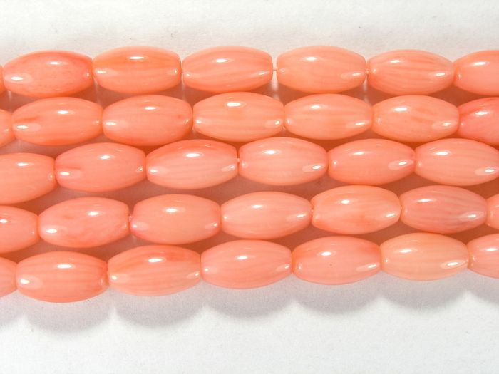 Бусина из коралла розового, облагороженного, фигурная, 5x9 мм (овал, гладкая)