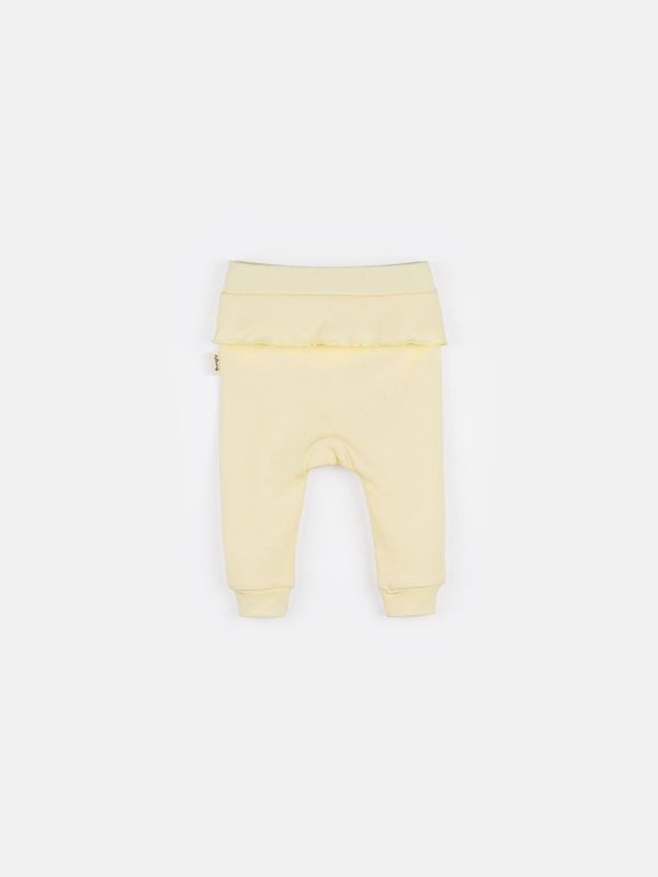 Ползунки с открытой ножкой и рюшей 