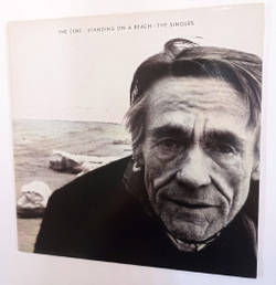 Винтажная виниловая пластинка The Cure Standing On A Beach The Singles (UK 1986)