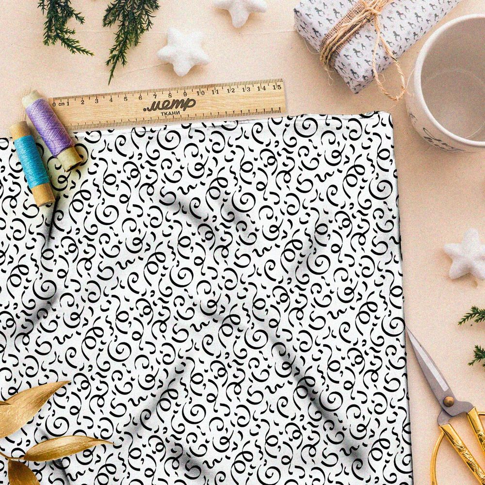 Ткань интерлок мелкие каллиграфические узоры на бежевом фоне