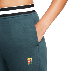 Женские теннисные брюки Nike Dri-Fit Heritage Core Fleece Pant - deep jungle