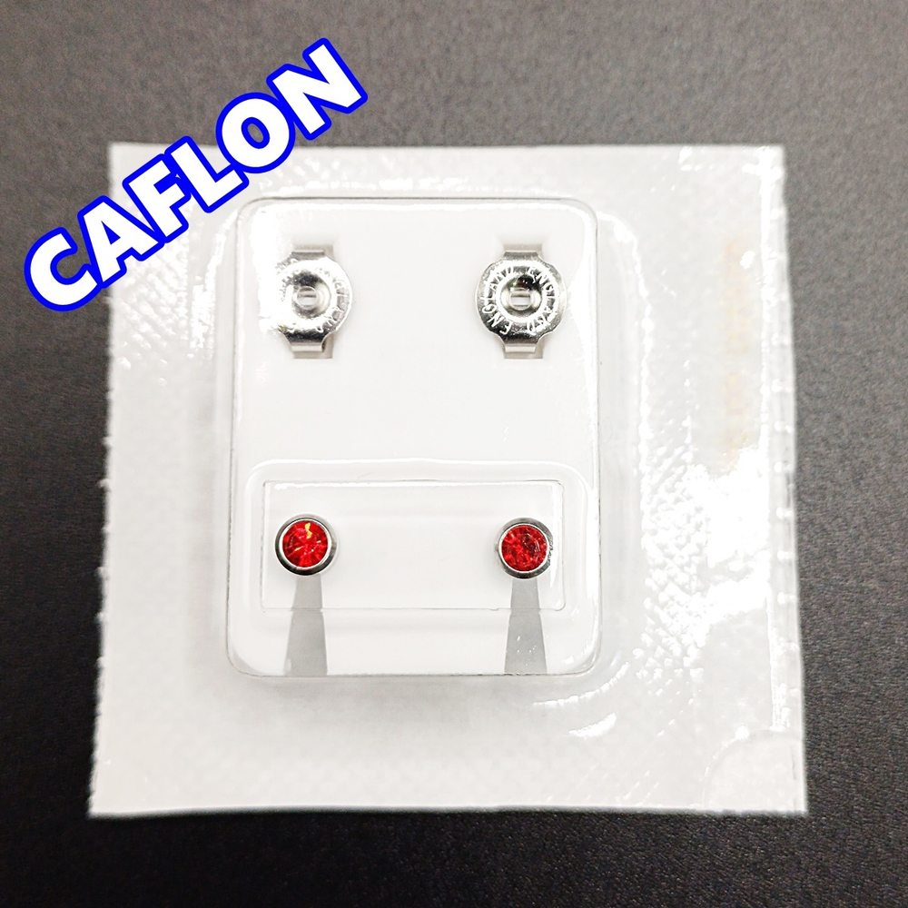 Серьги-гвоздики для прокола ушей под пистолет. CAFLON (Англия). Серебристые с красными ( Июль)кристаллами