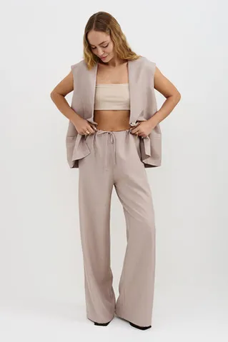 Брюки свободные на резинке серо-бежевого цвета
