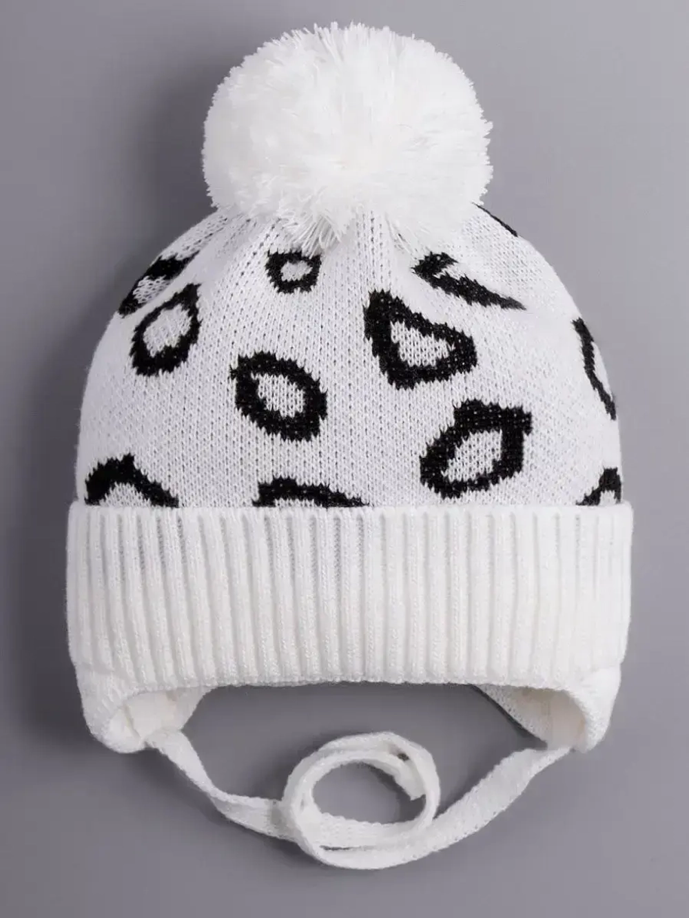 Шапка для девочки на завязках на осень