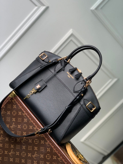 Louis Vuitton Lock It MM Bag