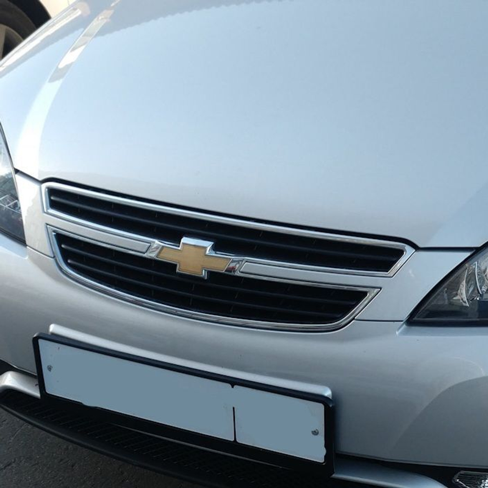 Джентра решётка знак шевроле серебро