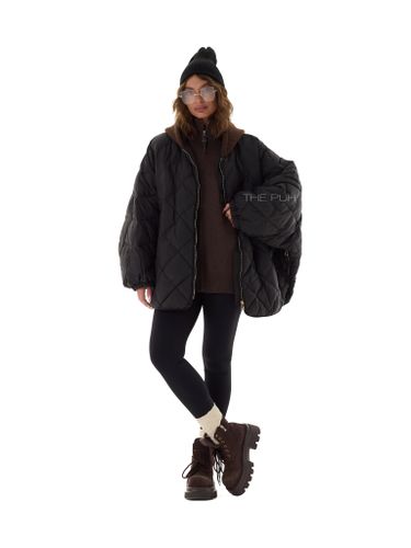 Черный пуховик-летучая мышь с вязаным капюшоном