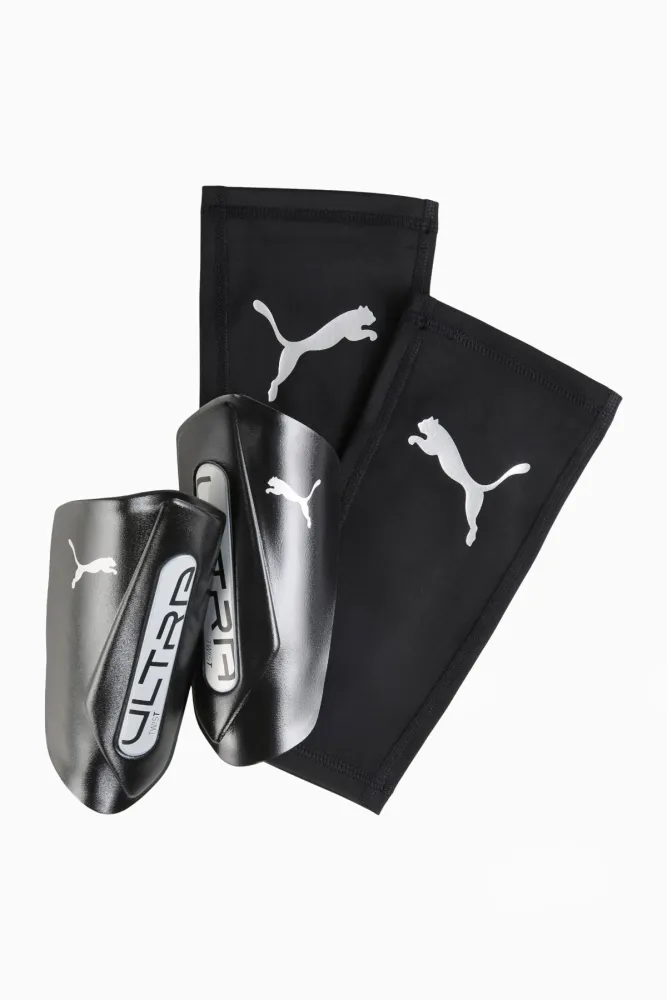 Футбольные щитки Puma ULTRA Twist Sleeve - черный Футбольные щитки Puma ULTRA Twist Sleeve - черный