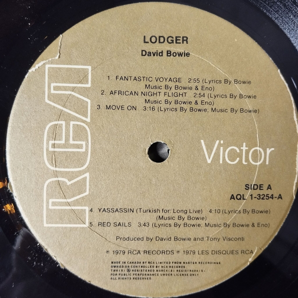 Винтажная виниловая пластинка LP David Bowie Lodger (Canada 1979)