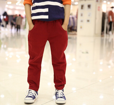 Брюки однотонные с эмблемами и кожаными вставками