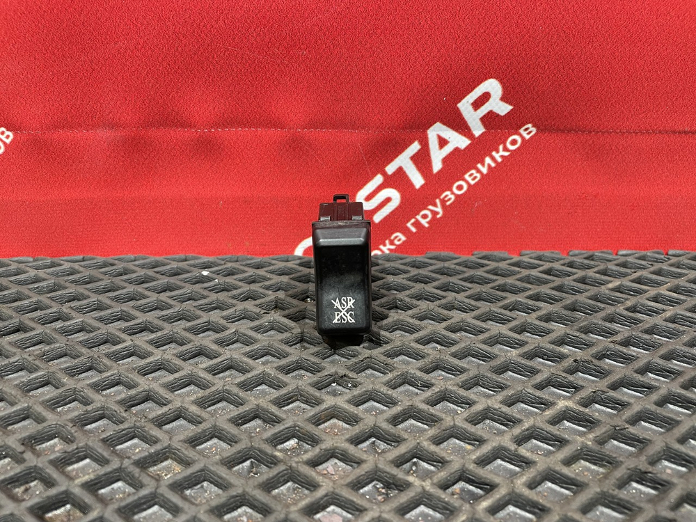 Кнопка системы ASR/ESC