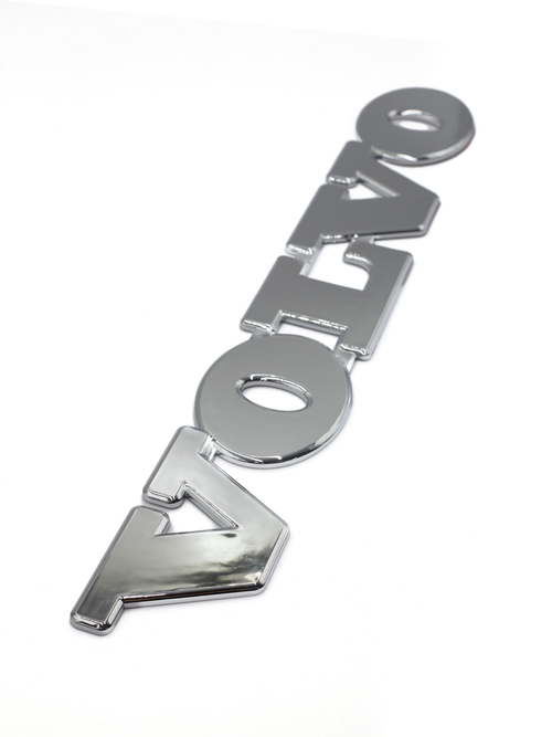 Наклейка / Шильд VOLVO (полиуретан 46х7 см). Серебристая надпись VOLVO