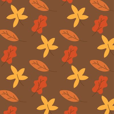 Осенние листья на коричневом фоне. Желтые, красные, оранжевые