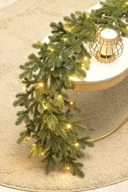 Хвойная ветвь Чарующая 180*30 см., 48 теплых-белых LED ламп, 100% литая хвоя, ЕлкиТорг (52092)