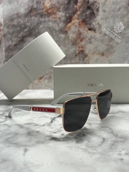 Солнечные очки Prada