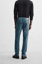 Джинсы slim fit