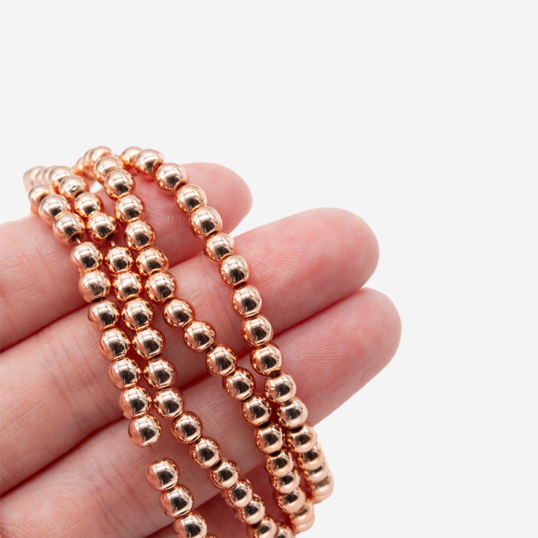 Гематин (гематит), оттенок "Розовое золото", шар (разделитель) 4,4мм