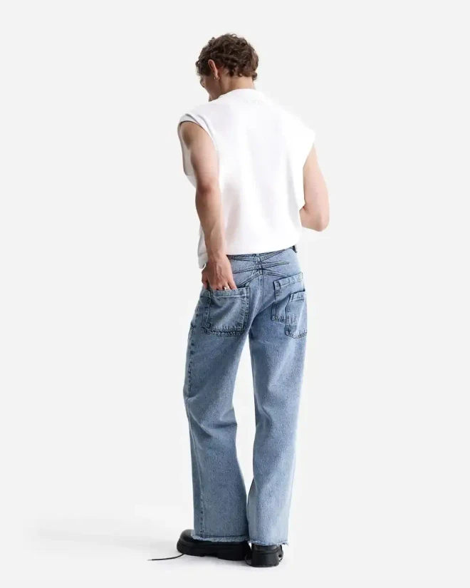 Джинсы с эффектом апсайклинга синие