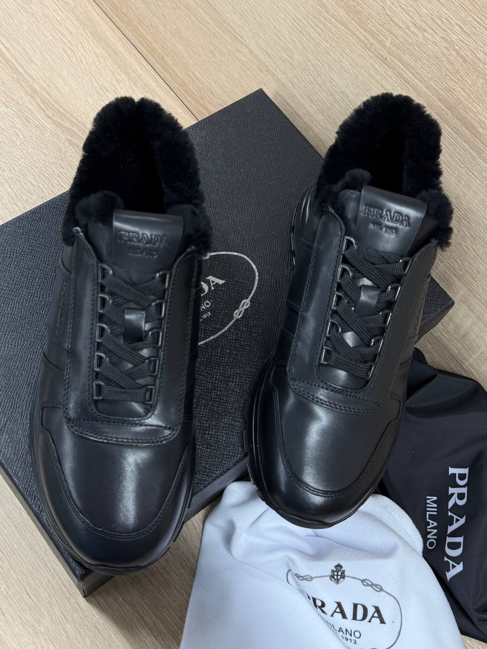 Кроссовки Prada