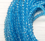 БП016НН23 Хрустальные бусины "рондель", цвет: ярко-голубой прозрачный, 2х3 мм, кол-во: 95-100 шт.