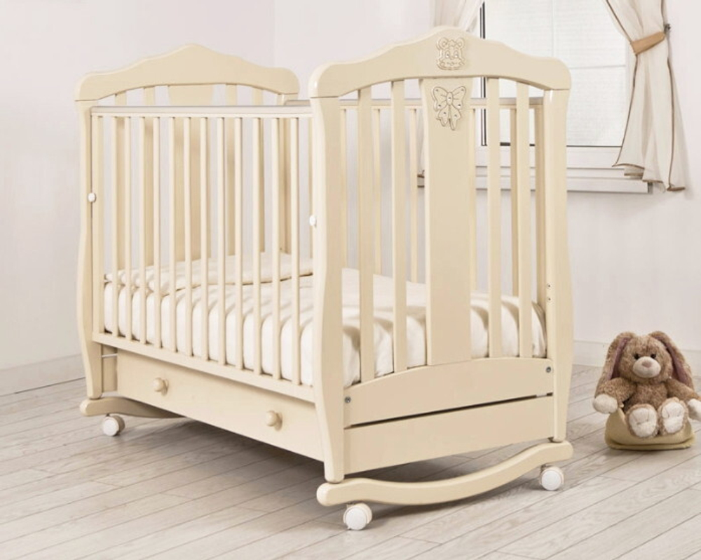 Детская кроватка Гандылян Доминик колесо-качалка 120x60 см слоновая кость