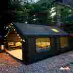 Пневмокаркасная всесезонная палатка «Тёплая Искра» 3,6×4,8×2,2 м — с печкой, из ПВХ, чёрная