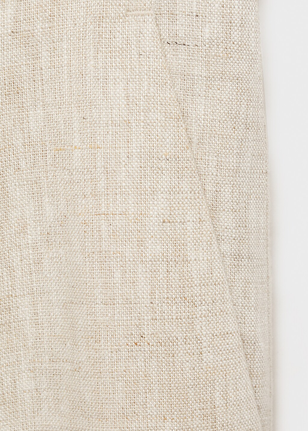 Льняные брюки с защипами