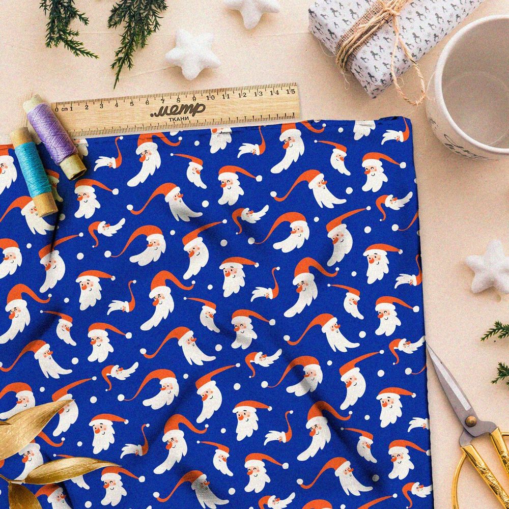 Ткань ниагара мелкие санта-клаусы на синем фоне