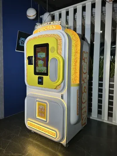 Готовый бизнес-комплект вендинговый автомат по приготовлению попкорна «Delicious moments»