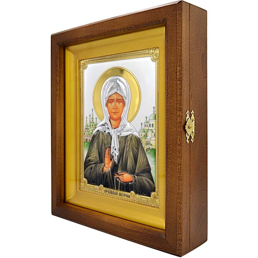 Икона Матроны Московской в серебряном окладе, в деревянном киоте.
