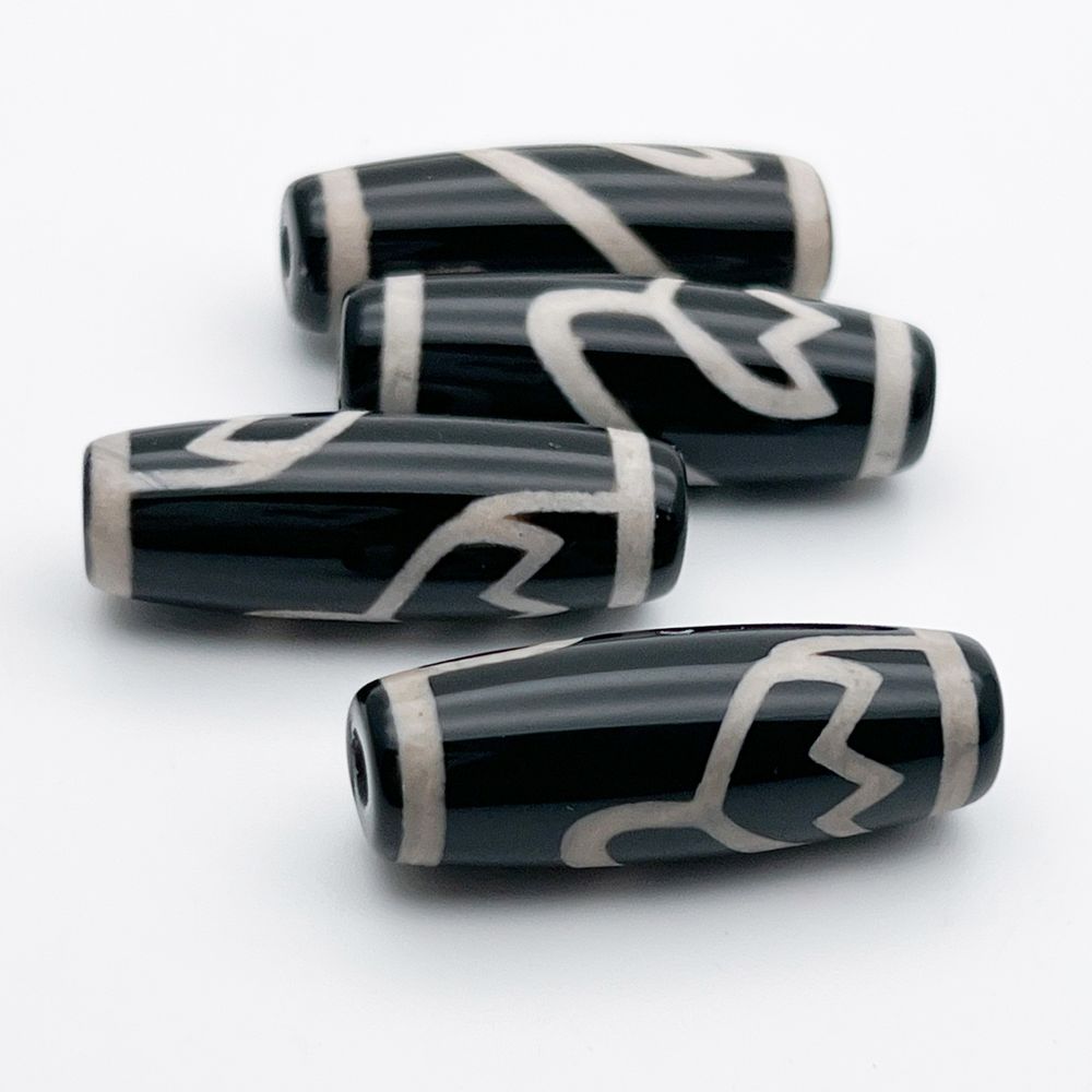 "Дзи" Лотос, размер около 30*10 мм, цена за 1 шт