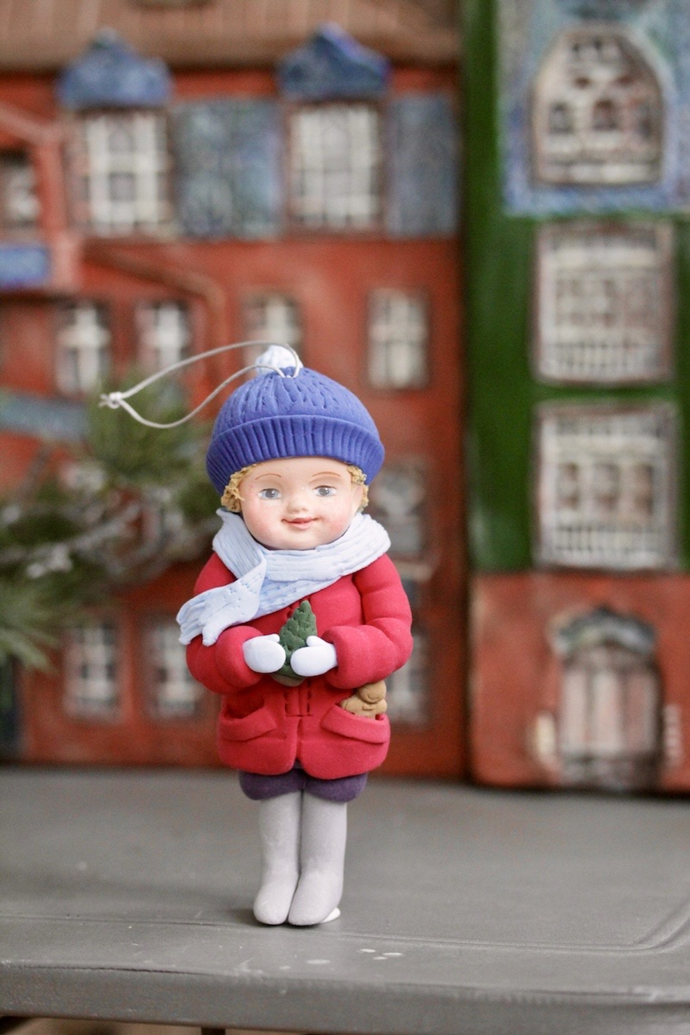 Елочная игрушка Пупсик из полимерной глины Мальчик в синей шапке