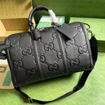 Средняя дорожная сумка Gucci Jumbo GG