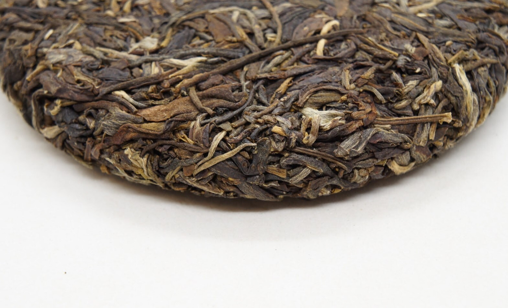 59282 Чай прессованный зеленый Пуэр Шэн "Сэнчжун, Биндао", мини бин 100гр