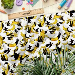 Ткань оксфорд 600 яркие бананы с чёрными тенями на белом фоне