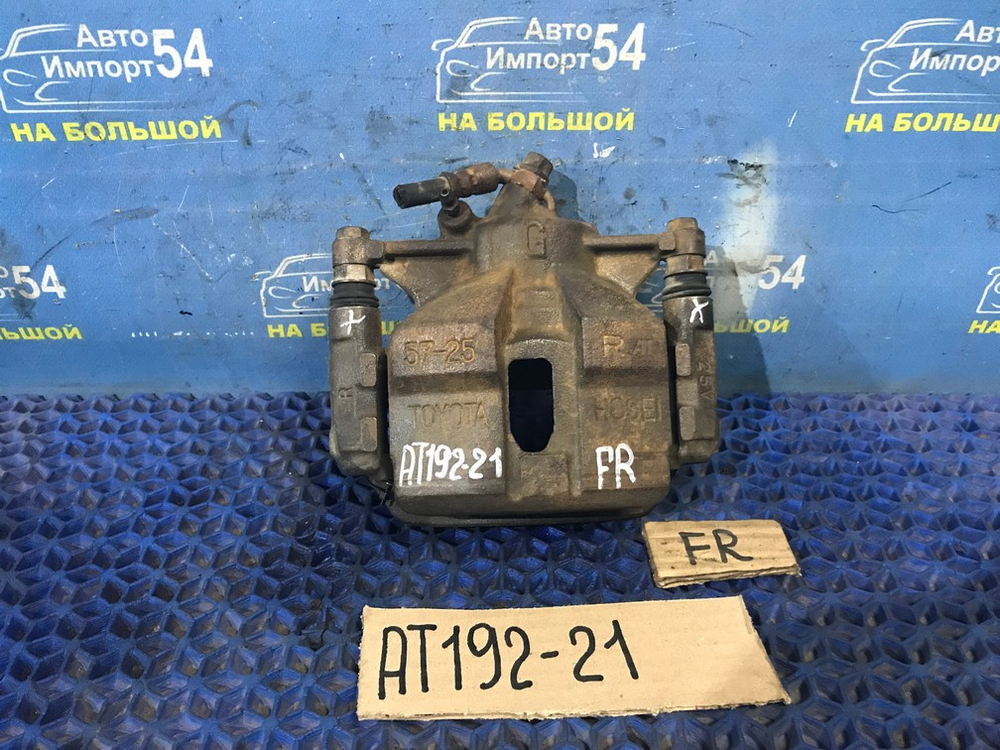 Суппорт тормозной передний правый TOYOTA CARINA 1994