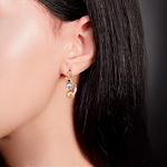 Серьги «Кометы» с английским замком из комбинированного золота с аметистом и гранатами