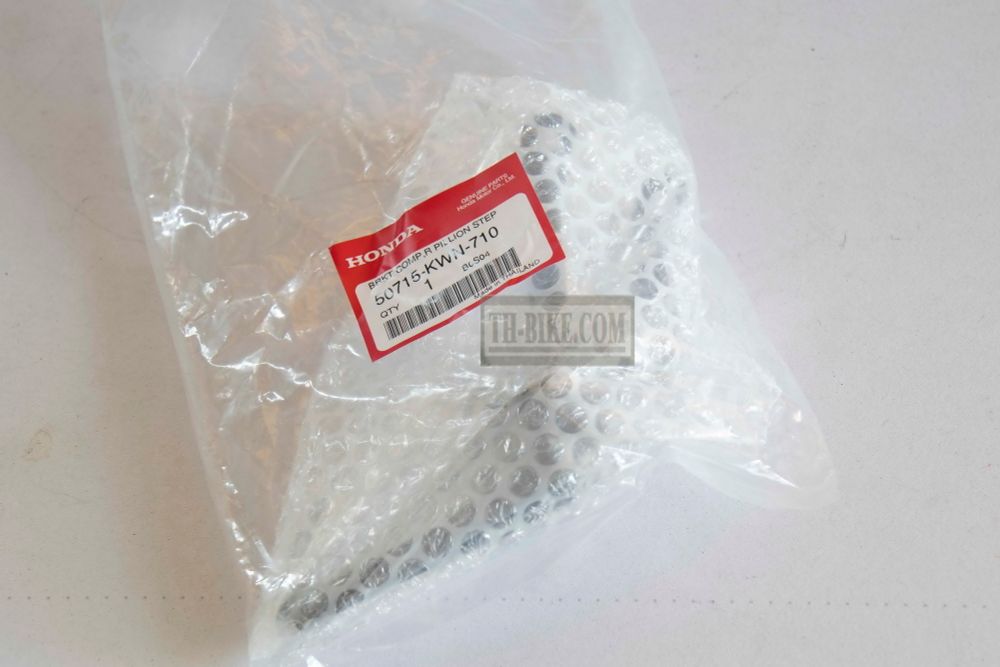 50715-KWN-710. BRACKET COMP., R. PILLION STEP. Passenger step footrest bracket Honda PCX