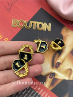 Пуговицы Скиап. золотистые с черной эмалью в виде замка