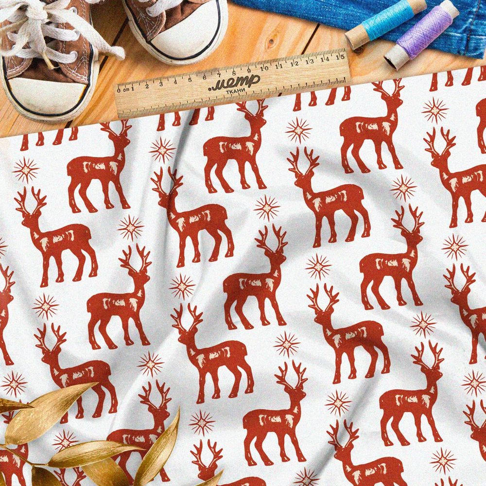 Ткань атлас красные олени и звёзды на белом фоне